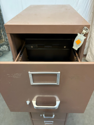 (1) 4 Drawer Brown Filing Cabinet