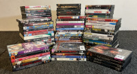 100+ Assorted Genre In Case Dvds Including Catwoman, Garfield & More