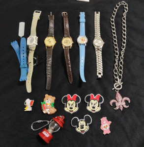 (6) Assorted Designed Collectable Pins, (1) 2" Mini Light-up Keychain Red Coleman Lantern, (5) Assorted Watches, & (1) Necklace