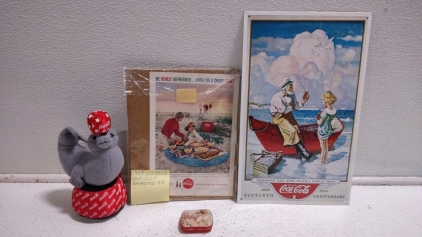 A Vintage Coca Cola Advertising Retro 50th Metal Sign Through The Years Fisherman, A Vintage Coca-Cola Advertisement from a 1959 Magazine, Vintage Coca-Cola Tin for Mints, & A Coca-Cola Circus Seal Stuffed Animal