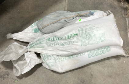 (3) Quikrete Sandbags (1) Small Sandbag