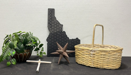 (1) Idaho Shaped Wall Decor (1) Wicker Basket (1) Cross (1) Faux Plant in Vase