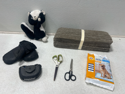 (13) Staircase Carpet Pieces (1) Stuffed Skunk (1) Cleveland Golf Putter Cover (1) 4 Pack Puppy Training Pads (1) Pair Kids Winter Mittens