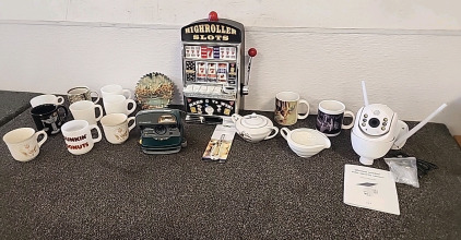 HighRoller Slots (Play) Mini Slot machine .. Wireless Outdoor Solar Security Camera.. Cream and Sugar Serving set... and a Variety of Coffee Cups..