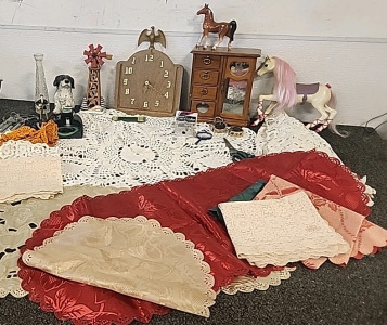 Wooden Jewelry Box with 4 Wooden Drawers With Glass Necklace Display... Hand Knitted Table Doylie Pieces.. Festive Table Runners... Wall Clock.. Ceramic Windmill.. Electric Putting Pal .. Elvis Figurine.. Windchime.. and More..