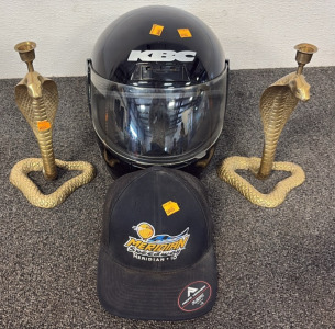 (1) KBC Bike Helmet, (2) Metal Twin Snakes Candle Holder, (1) Meridian Speedway Hat