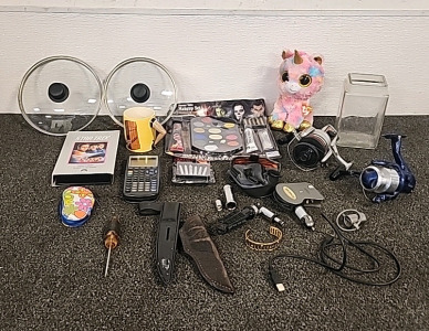 Ryobi Fishing Reel... Cabela's King Fishing Reel... Face Paint Makeup... 2 Pot Lids.. Knife Sheaths... Colorful Stuffed Unicorn... and More...