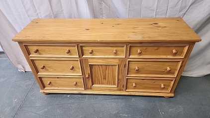 Very well Made 7 Drawer Dresser With 1 Cubby a Solid Piece of Furniture..34" Tall 66" wide.. 19" Long..