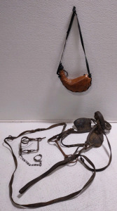 A Antique Conibear trap, A Vintage Leather Canteen Bota Bag Flask with Leather Shoulder Strap, & A Antique Horse Bridle