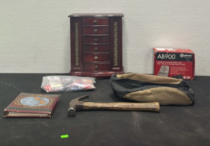 (1) Vintage Jewlery Box (1) Answering Machine (1) Fanny Pack (1) Vintage Phonebook (1) Hammer (1) Bag of Colored Pellets