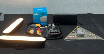 (1) Amazon Echo Dot (1) Bluetooth Wireless Speaker (1) Tool Kit (1) Wallet Ninja (2) Philips Lights