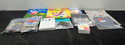 (3) Children&rsquo;s Books (1) Boy T-Shirt (1) Youth Mousepad (4) Koala Balloons (2) Packs of Babyshower Invitations (1) Bag of Kids Toys (1) Colic Reliever for Babies (10ct)