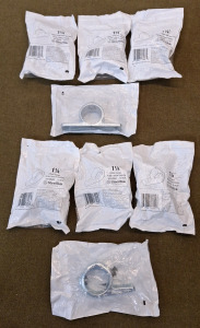 (4) SteelTek 1-1/4" Galvanized Offset Flange W/ Two Tabs & (4) SteelTek 1-1/4" Galvanized Offset Flanges W/ Single Tab