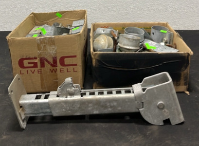 (1) Blx of Joist Hangers (1) Box of Metal Caps & Other Metal Accessories (1) Metal Adjustable Tool