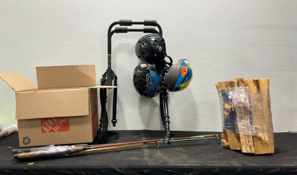 (4) Fishing Poles (3) Helmets (1) Bike Rack (1) Bundle of Firewood (1) Box of Kitchen Supplies