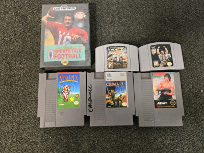 (3) NES Game Cartridges, (2) N64 Game Cartridges, (1) Sega Genesis Joe Montana 2 Sports Talk Football