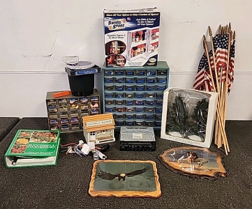 Sewing Organizers with Colored Thread.. 2 Shimmering Spruce Trees with Multi Colored Lights.. Small American Flags .. Step by Step Gardening Handbook.. Presto Fry Baby .. Storage and Spice Organizer.. Infinity Car Stereo..and an American Eagle Picture.. 