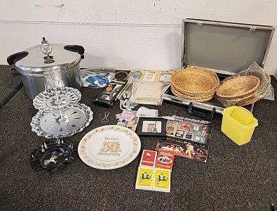 Presto Pressure Cooker.. Silver teired serving tray .. Briefcase. Wicker Paper Plate Holders.. Clothing Patterns.. 50th Anniversary Plate.. and More..