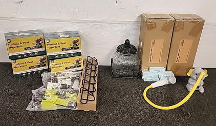 2 Shelter Innovation Camping Chairs.. 4 Boxes of Rodent &Pest Repellent.. Glass Candy Jar.. Elephant Temperature Control Shower for Babies.. and More..