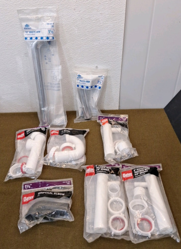 (1) 1-1/2" Dearborn 15" / 24 Guage Chrome Plated Brass Waste Arm (1) ) 1-1/2" Dearborn 7" / 24 Guage Chrome Plated Brass Waste Arm, (1) 1-1/2", Oatey End Outlet Tee, (1) 1-1/2", Oatey J-Bend, (1) 1-1/2", Oatey Disposal Elbow, (1) 1-1/2" Oatey 8" Dishwash
