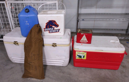A White Igloo 150 gal Cooler, A Red Ultra 70 Qt. Cooler, & More!!