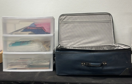 (1) Suitcase (1) Plastic Storage Dresser w/ Books, Magazines, Bedding, etc.