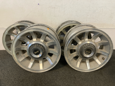 4 Aluminum Jeep rims without tires