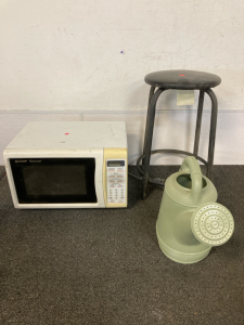 Sharp microwave , Small stool black, and watering can