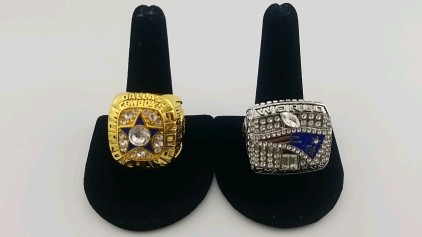 (1) Large Golden Plated Dallas Cowboy Ring - Size 11, (1) Large Silver Plated World Champions Patriots Ring - Size 12