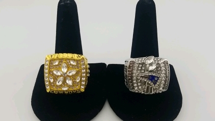 (1) Large Golden Plated Dallas Cowboy Ring - Size 11, (1) Large Silver Plated World Champions Patriots Ring - Size 12