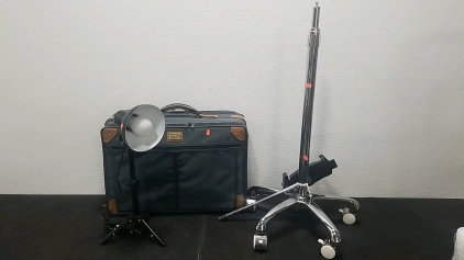 Frequent Traveler Carry on Bag(s) Black Lamp, Rolling Chair Legs/Parts