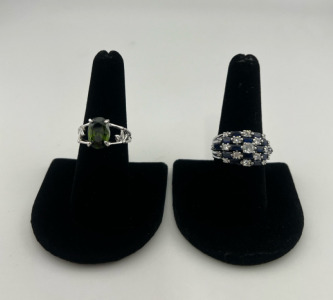 (1) Size 7.5 Green Emerald Faceted Oval Cut Ring (1) Size 9 Blue + White Sapphire Ring