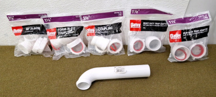 (1) 1-1/2", Oatey 90&deg; Elbow, (1) 1-1/2", Oatey Form N Fit Coupling, 3" To 7", (1) 1-1/2", Oatey Coupling, (2) 1-1/2" Oatey Heavy Duty Trap Adapters & (1) 1-1/2" Oatey Bend Quarter