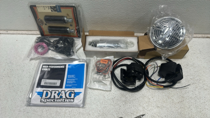 Collection of Various Harley Davidson Parts Including: Electronic Horn, Custom Foot Pegs, High Performance Cables, and More!