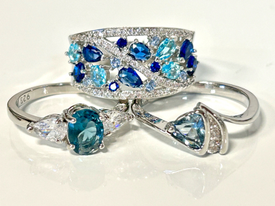 (3) Beautiful Rings: Blue and White Saphire, Aquamarine and Blue Saphire, and Aquamarine Trillion Cut