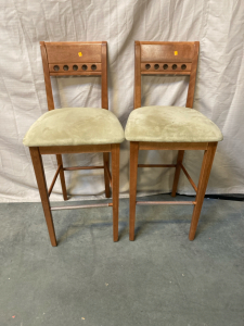 2 tall chairs 1 has small hole