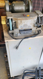 2 Double Sided Grinders, One With Wire Brush Attached To Table