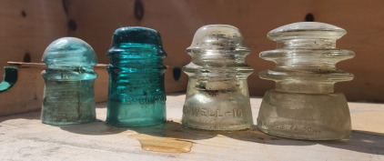 Various Sized Glass Insulators, And A Bucket of PVC Pipes, Shower Head, And More!