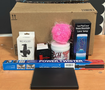 (1) Lava Mood Lamp (1) Alpha 20V Power Inverter (1) One Lbs Black Cherry BCAA Dietary Supplement & An Amazon Returns Box