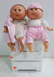 (3) Doll Dresser & Baby Dolls - (1) White Wooden Doll Dresser (1) Baby Doll in Pink Pants (1) Baby Doll in Pink Robe