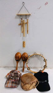 (8) Musical Play Lot - (1) Pink Fabric Storage Bin (1) Bamboo Wind Chime (1) Pair of Wooden Maracas (1) Tambourine (1) Small Drum (2) Hats