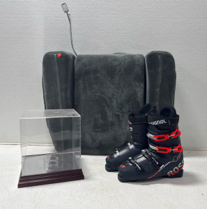(1) Pair of Rossignol Ski Boots -305, 348mm (1) Ball Trophy Case (1) TV Arm Chair With Overhead Light