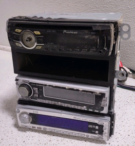 (1) Pioneer DEH-4300UB Car Radio, (1) Clarion DX515 Car Stereo, & (1) Roadstar CD-801MP/FM Car CD MP3 Player