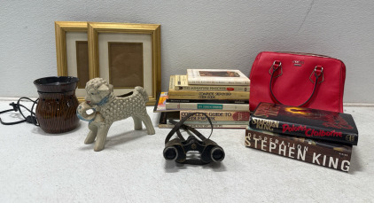 (1) Red Guess Purse (1) Vintage Binoculars With Leather Strap (2) Stephen King Books- And Assorted Cook Books And More