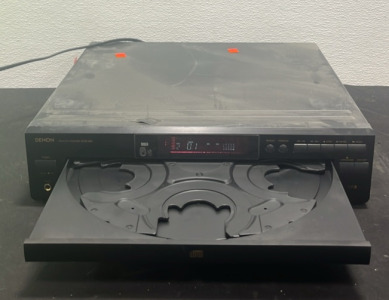 (1) Denon 5 Disc Automatic Disc Loading System (MP3)