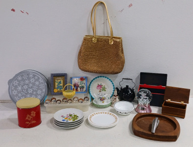 (27) Eclectic Home D&eacute;cor & Kitchenware - (1) Woven Handbag (1) Red Tin Canister (1) Black Teapot (1) Yellow Basket (1) Ceramic Creamer (1) Female Figurine (1) Glass Snow Globe (1) Wood Ashtray (1) Wooden Box (1) Jewelry Box (2) Framed Plaques (4) Floral P