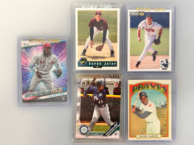(5) Collectible Sports Card: Hank Aaron, Chipper Jones, Julio Rodriguez, Derek Jeter, and Elly De La Cruz