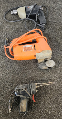 Black And Decker Variable Speed Reversing Rotary Power Cutter, Black And Decker 3/8" Drill, And An Electrical Soldering Gun