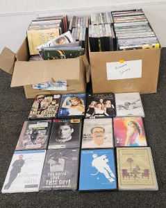 (2) Boxes of DVD's Including Carmen Electra's Workout Videos, MTV The Hills 1st Season, And More!