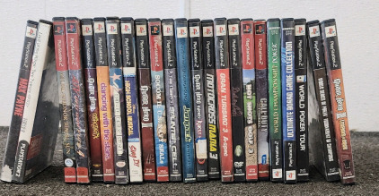An Assortment of Guitar Hero Ps2 Games and Various Other Playstation 2 Games